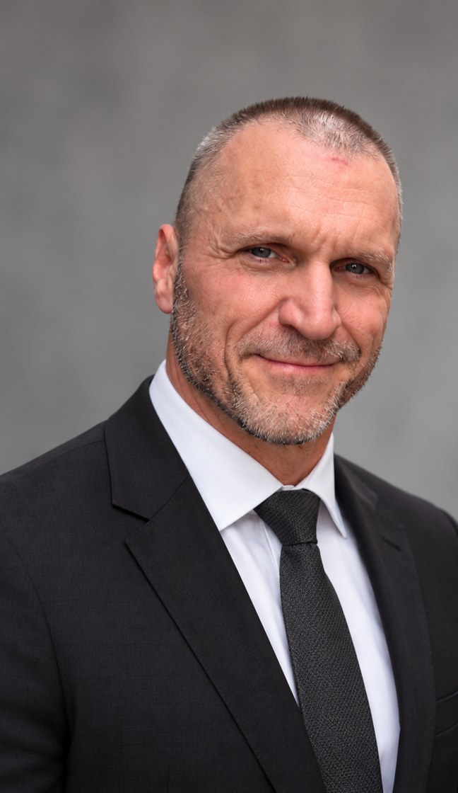 Larry Hoffman in a black suit